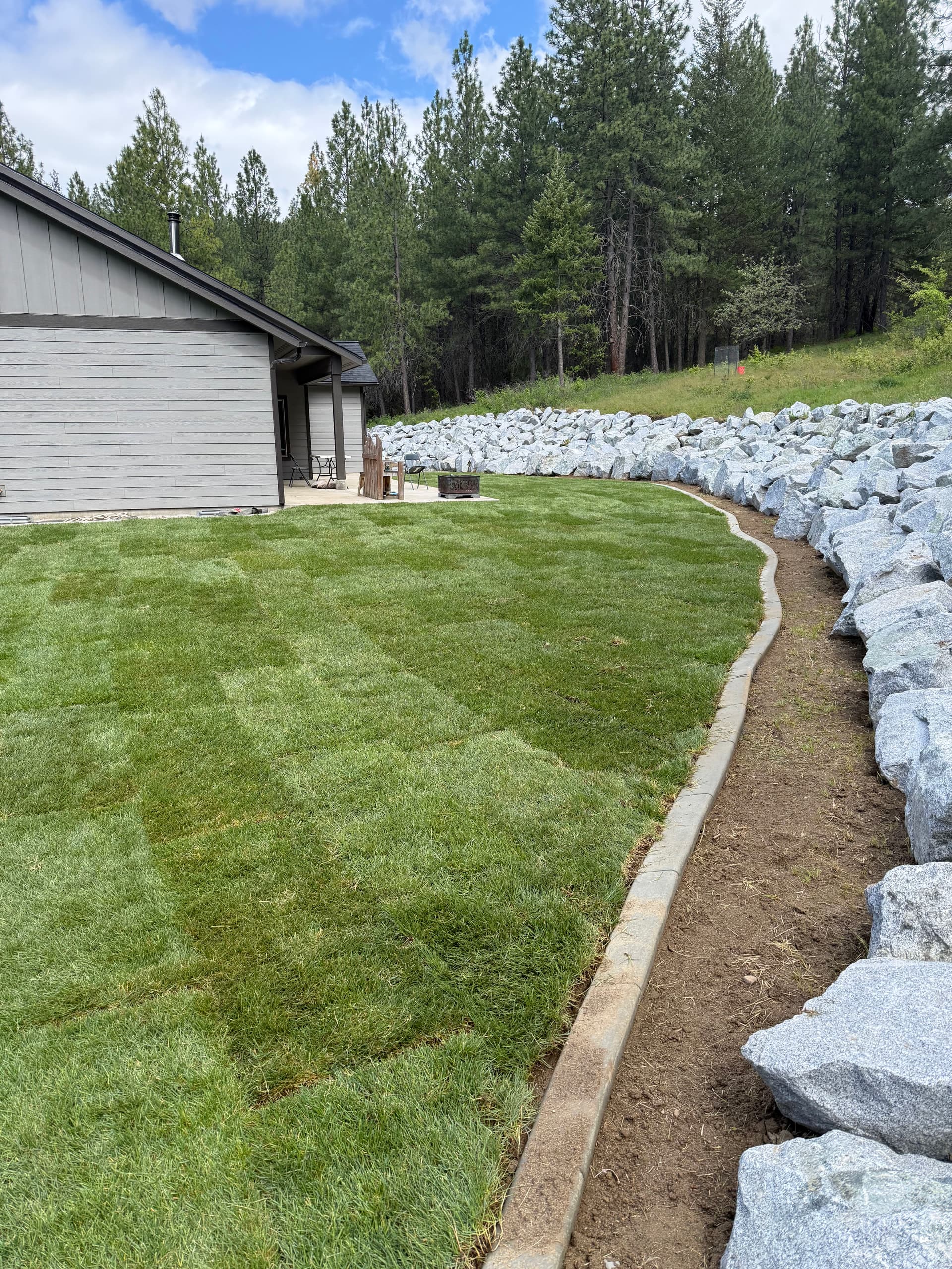 Gallery photos for Fresh Sod and Boulder Walls Give This Yard a Clean Finished Look: Image #3