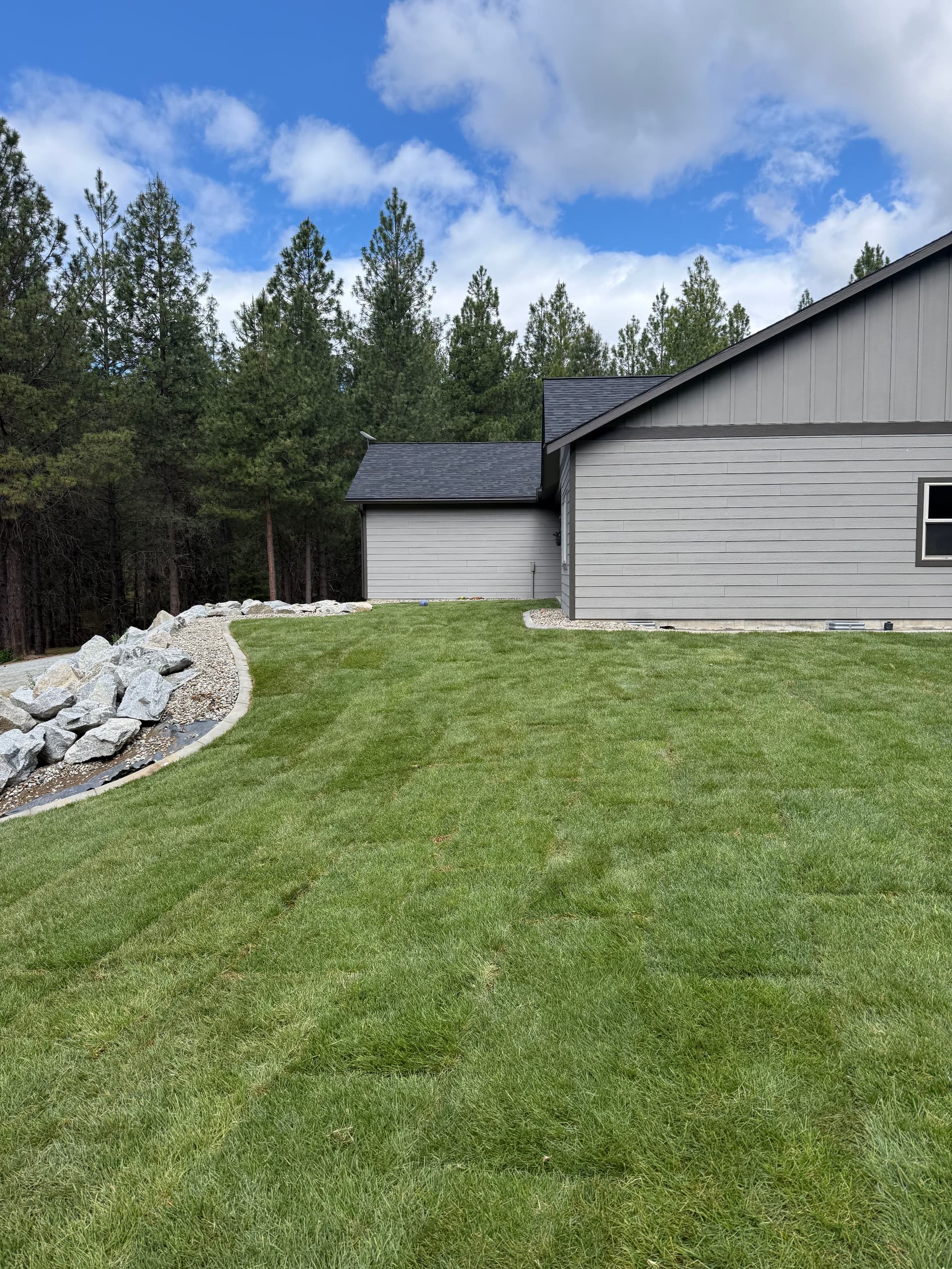 Gallery photos for Fresh Sod and Boulder Walls Give This Yard a Clean Finished Look: Image #2