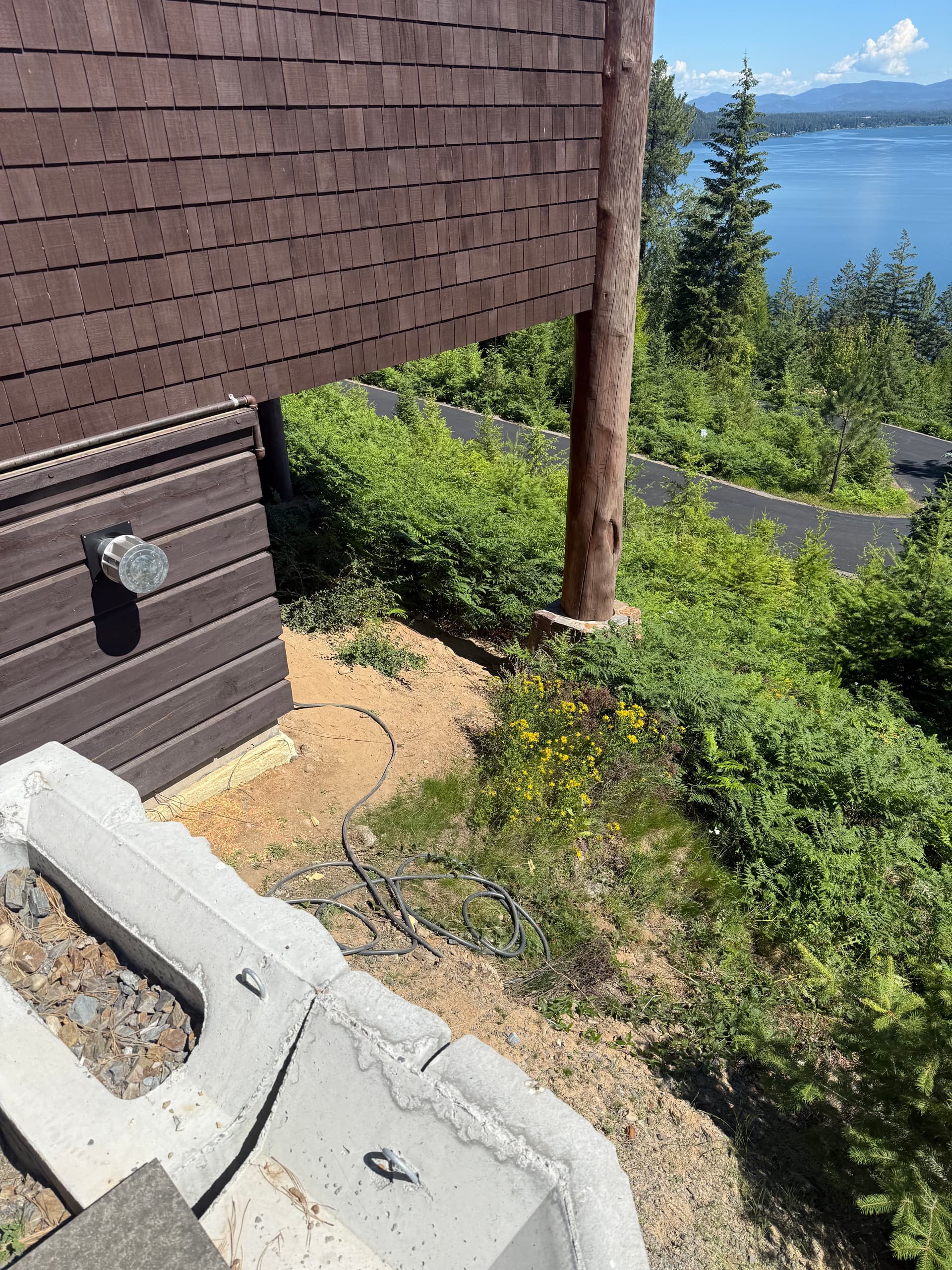 Gabion Basket Retaining Wall Turns Steep Slope Into Usable Space image