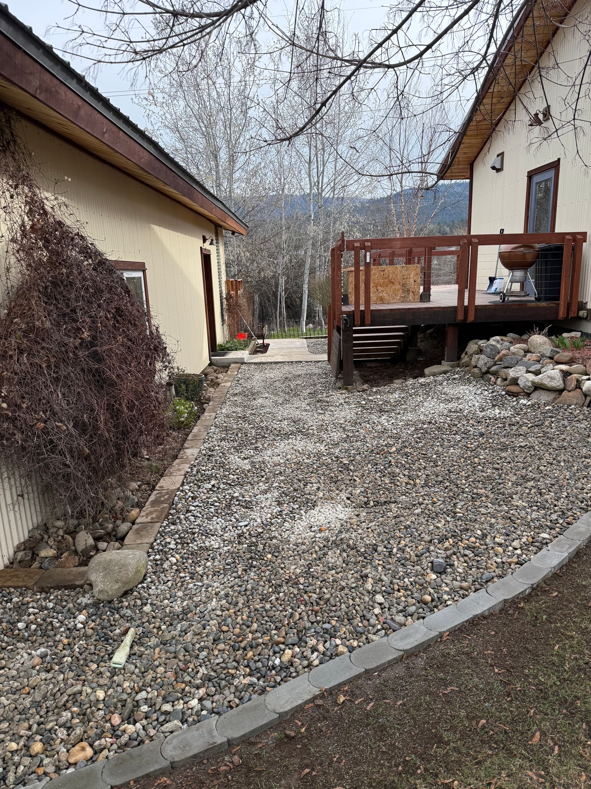 Gallery photos for Enhancing Outdoor Spaces with Boulder Walls and Concrete Curbing: Image #3